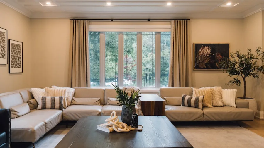 Modern living room showing properly proportioned accent chair positioned among existing furniture in bright, airy space